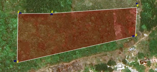 Site plan of the Michamvi Apartments Development: the plot boundary marked over satellite imagery of the surrounding landscape